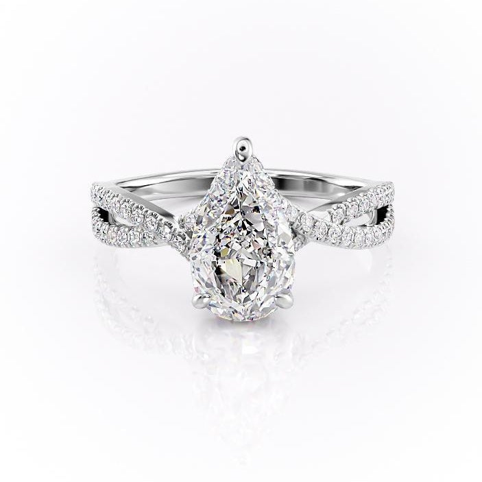 Pear Cut Moissanite Ring With Twisted Stone Set Shoulders