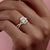 EMERALD CUT MOISSANITE ENGAGEMENT RING, TWISTED STONE SET SHOULDERS